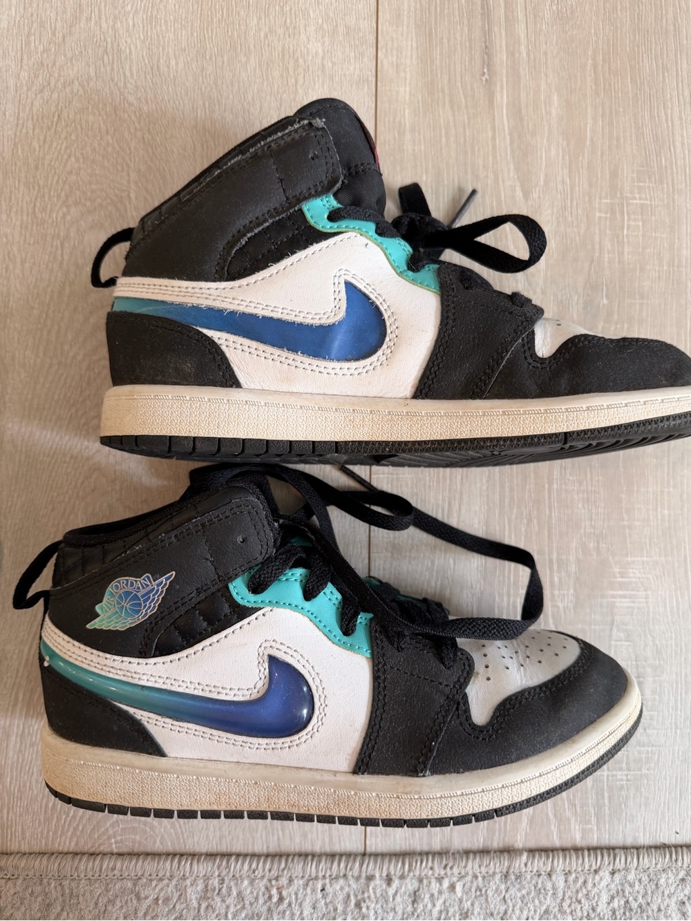 Nike Kids Black White Blue High-Top Sneakers with Teal Accents